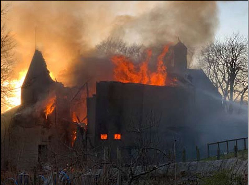 Montgarrie Mill aflame. Photo with permission of Jason Dory.